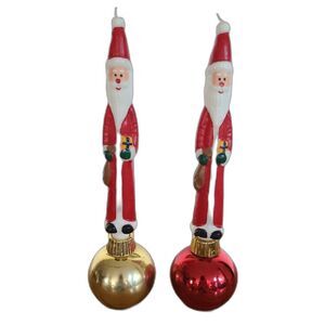 Two Vintage Santa Claus Character Candles In Christmas Ornament Candle Holders